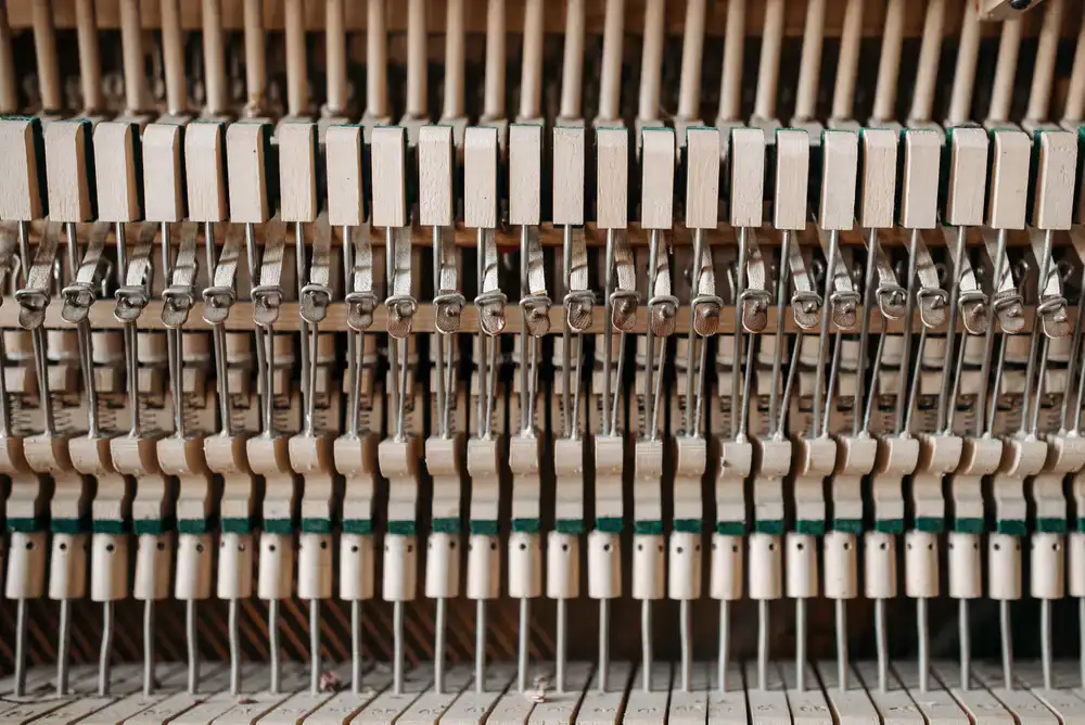 Professional tuning lever placed securely on tuning pins
